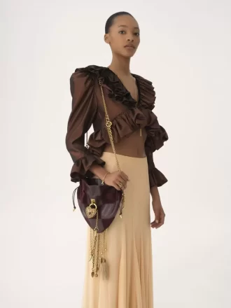 Château Treasures crossbody bag in grained & suede leather