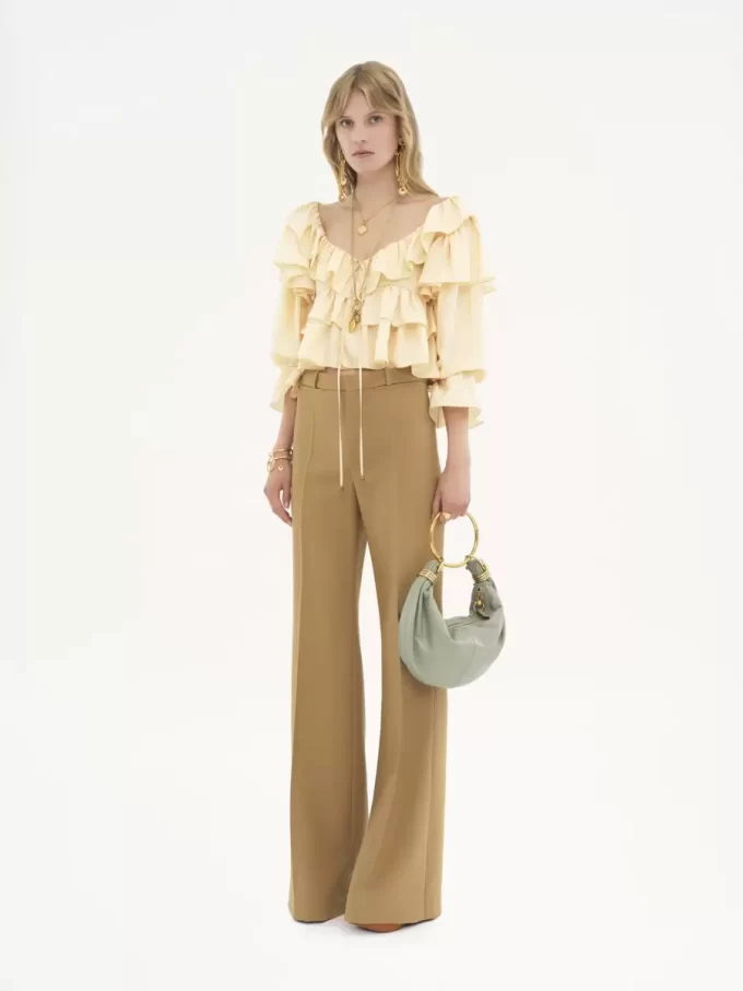 Flared tailored pants in wool grain de poudre