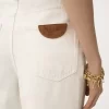 High-rise wide-leg jeans in denim