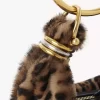 Mini Bracelet Hobo bag in leopard-print shearling