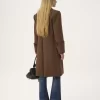 Riding coat in houndstooth wool Riding coat in houndstooth wool