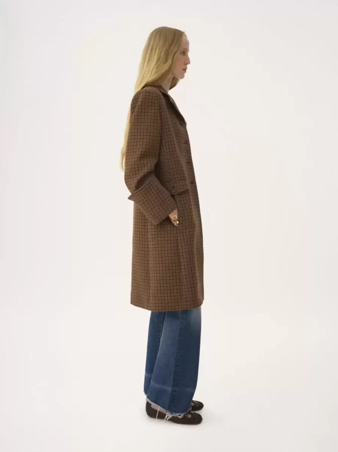 Riding coat in houndstooth wool Riding coat in houndstooth wool