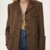 Riding coat in houndstooth wool Riding coat in houndstooth wool