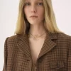 Riding coat in houndstooth wool Riding coat in houndstooth wool