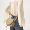 Small Marcie saddle bag in raffia-effect fibers